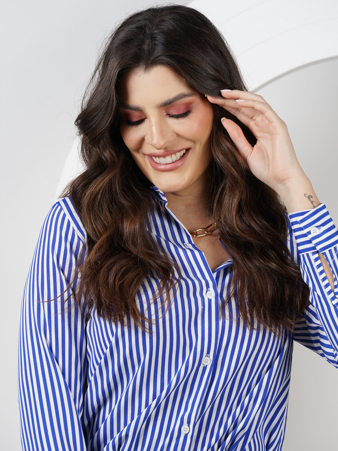 CAMISA LISTRADA FEMININA